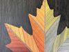 Video panning over the Autumn Maple Leaf wall art, showcasing the vibrant gradient colors and intricate geometric design.